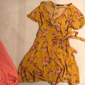 Yellow wrap dress with a tie front